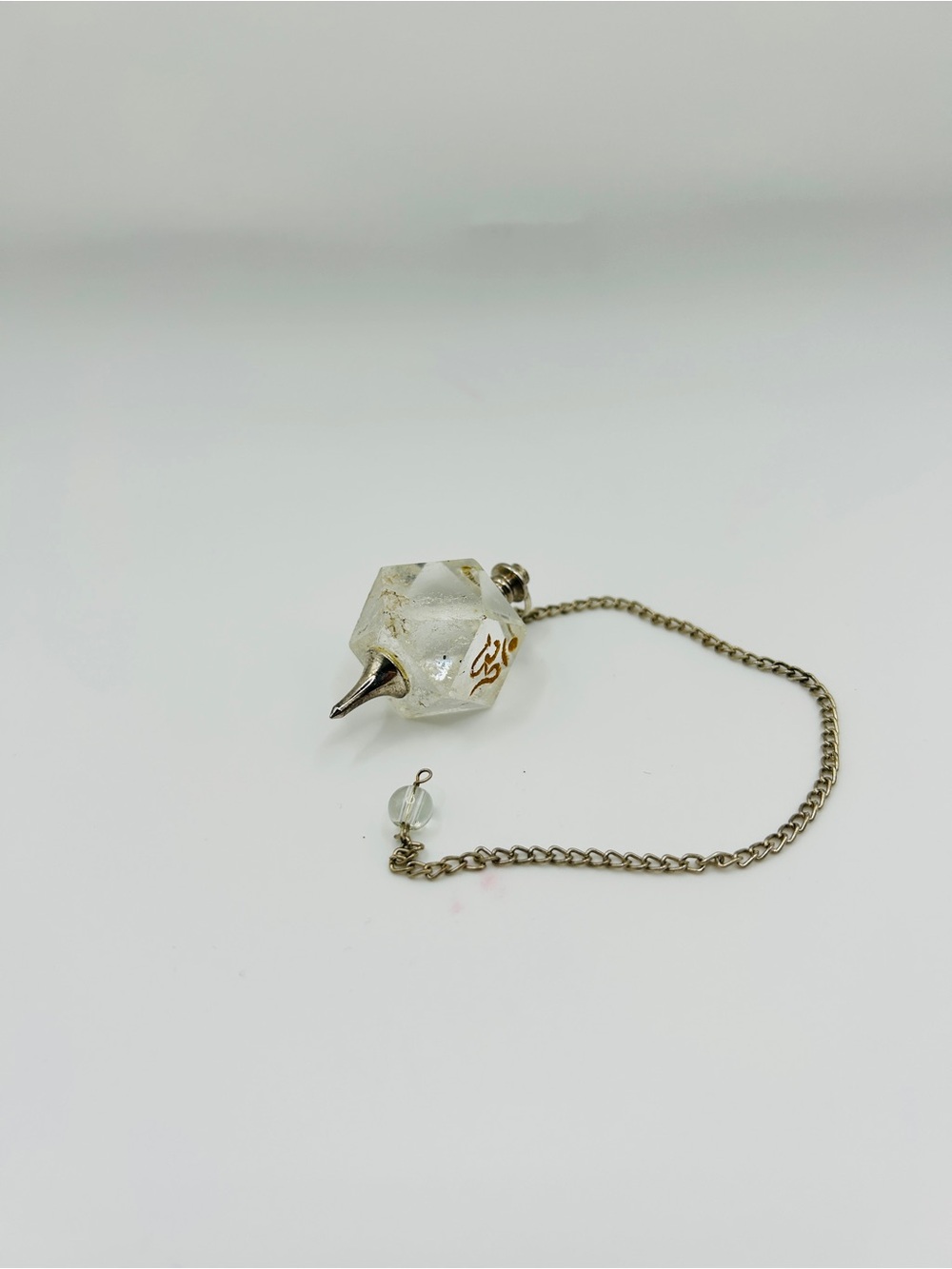Faceted Clear Crystal Quartz Pendulum with Om Symbol